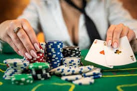 Live Casino Hold'em dealer at win galaxy77 studio